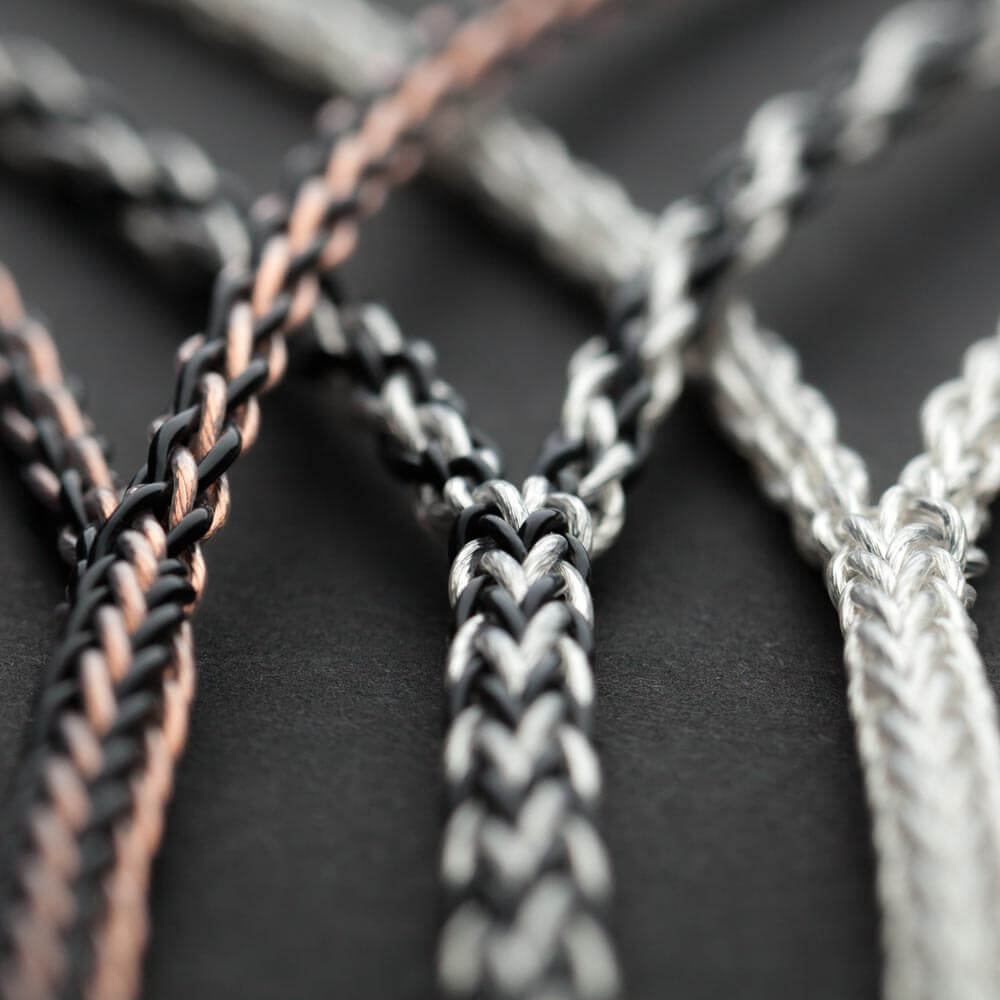 Kimber Kable Axios headphone cable, showing braided copper and silver conductors.