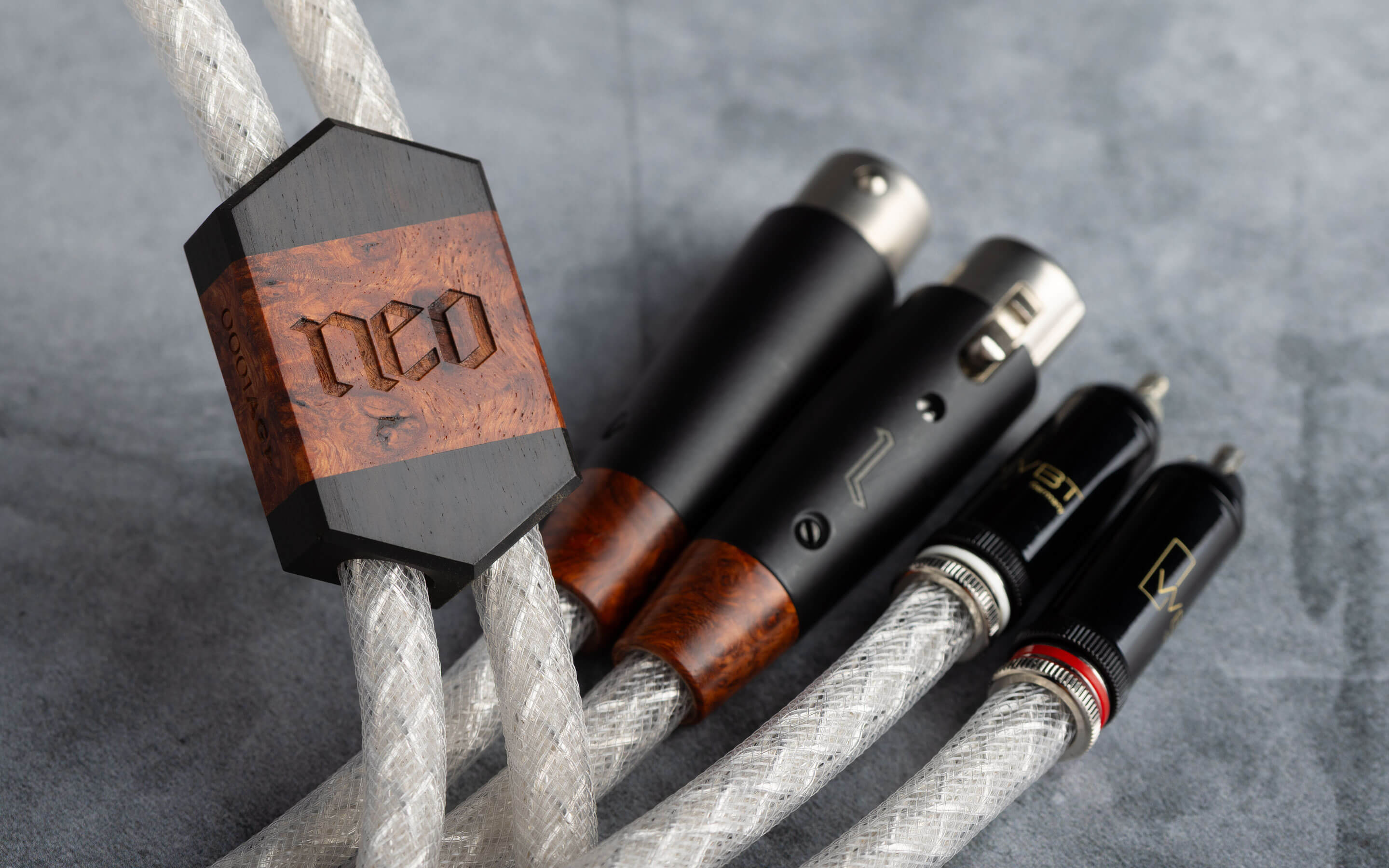 Kimber Kable Neo interconnect, showing its engraved hardwood collar and braided silver conductors.
